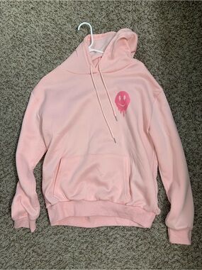 Women's Pink Pullover Hoodie with Smiley Graphic